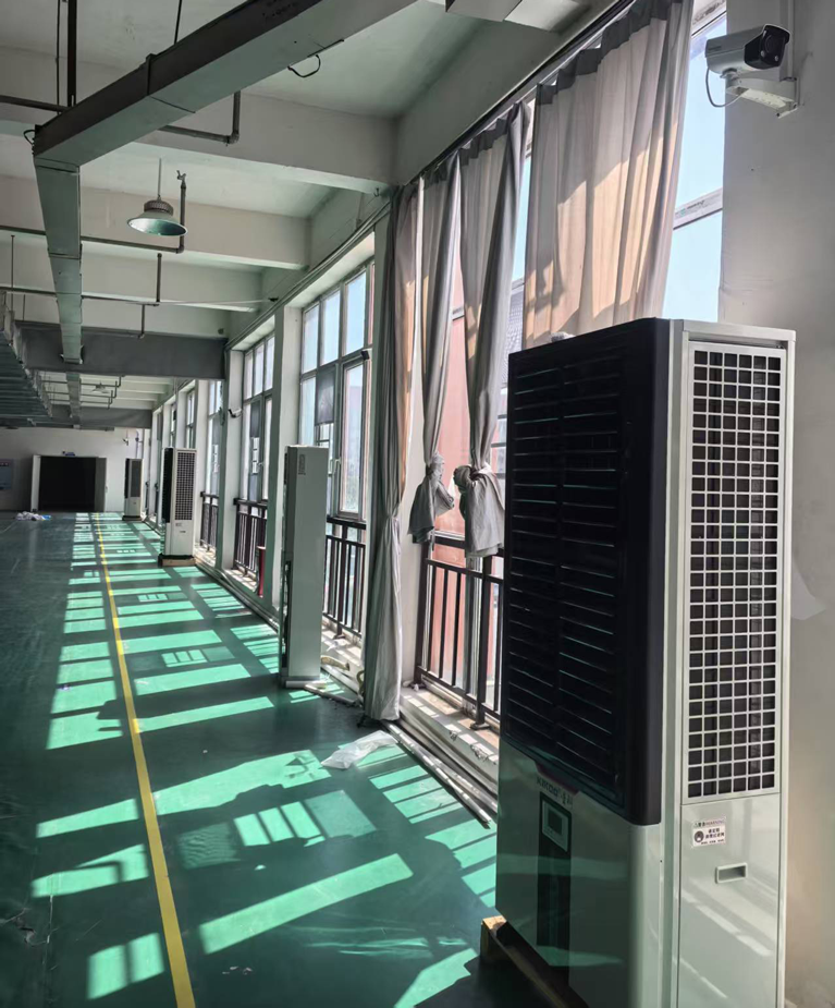 制衣厂整体制冷降温，应用蒸发冷省电空调立式轴流双风口